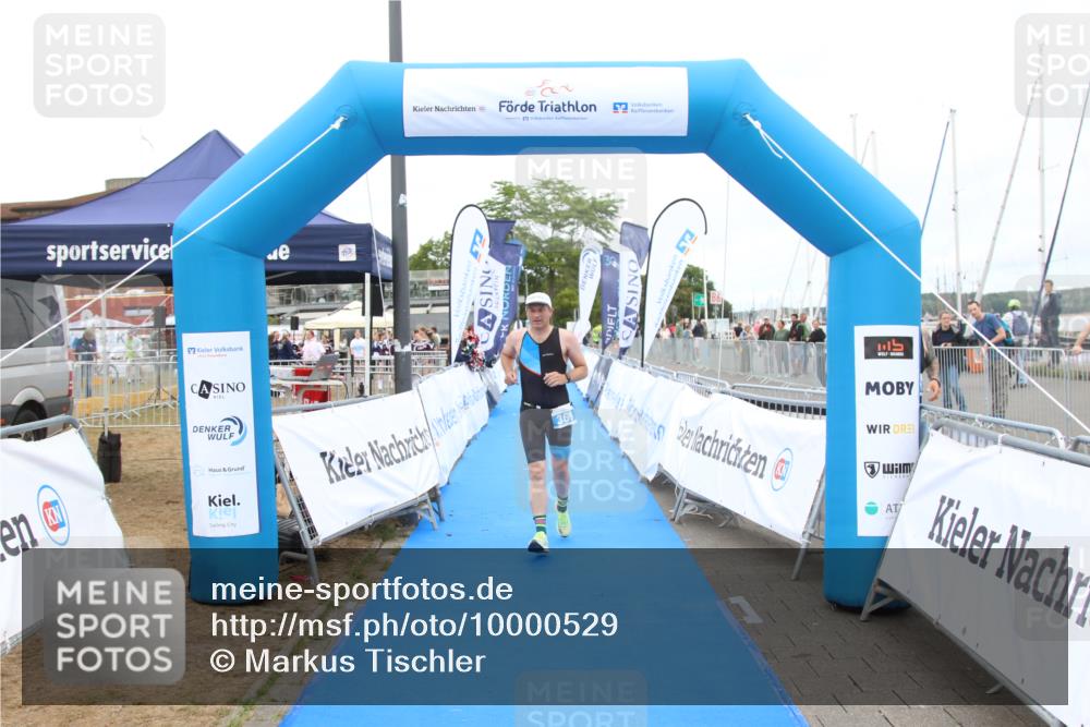 16.08.2026 - KN Förde Triathlon 2026 Markus Tischler http://msf.ph/oto/10000529 16.08.2026 12:21:29 Ziel 369, 369 meine-sportfotos.de