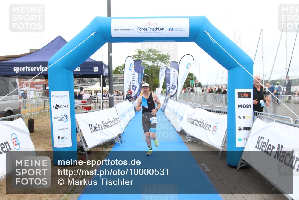 16.08.2026 - KN Förde Triathlon 2026 Markus Tischler http://msf.ph/oto/10000531 16.08.2026 12:21:29 Ziel 369, 369 meine-sportfotos.de