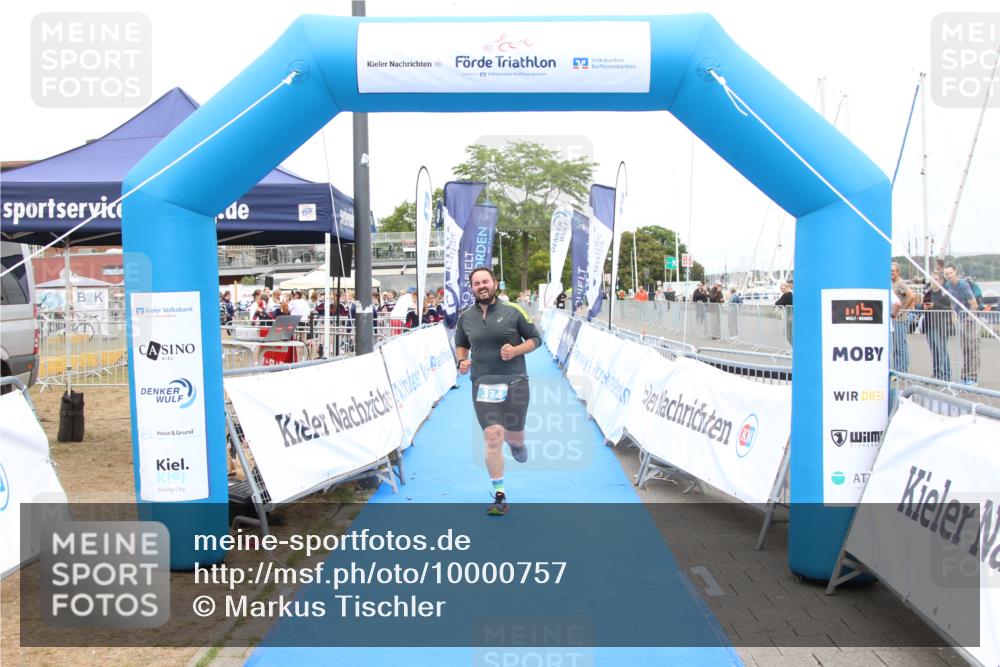 16.08.2026 - KN Förde Triathlon 2026 Markus Tischler http://msf.ph/oto/10000757 16.08.2026 12:24:21 Ziel 374, 374 meine-sportfotos.de