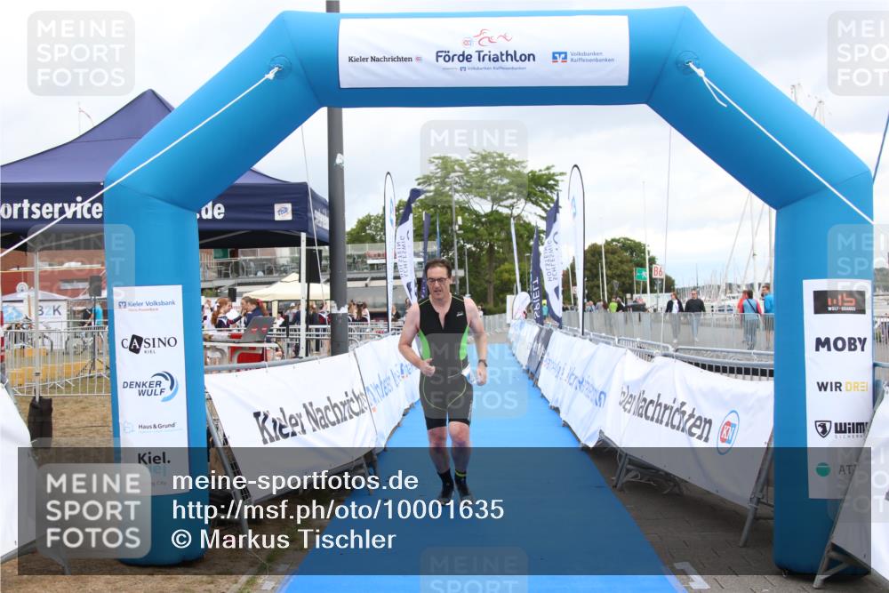 16.08.2026 - KN Förde Triathlon 2026 Markus Tischler http://msf.ph/oto/10001635 16.08.2026 12:47:39 Ziel 424, 424 meine-sportfotos.de