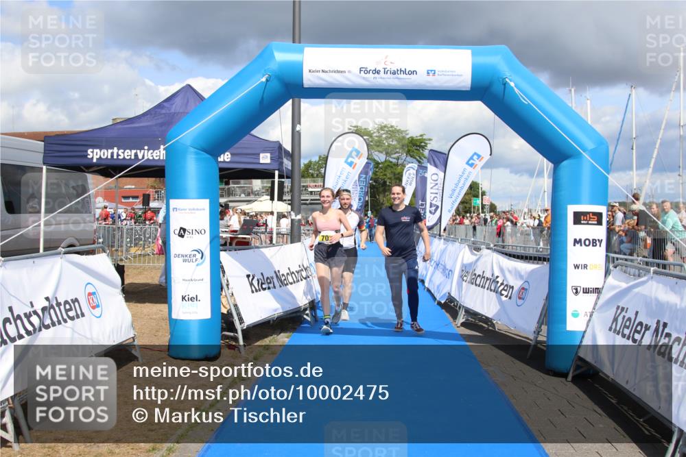 16.08.2026 - KN Förde Triathlon 2026 Markus Tischler http://msf.ph/oto/10002475 16.08.2026 14:01:50 Ziel 703, 703 meine-sportfotos.de