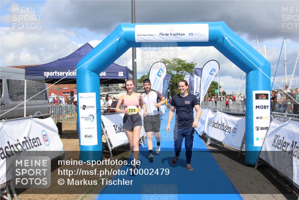 16.08.2026 - KN Förde Triathlon 2026 Markus Tischler http://msf.ph/oto/10002479 16.08.2026 14:01:51 Ziel 703, 703 meine-sportfotos.de