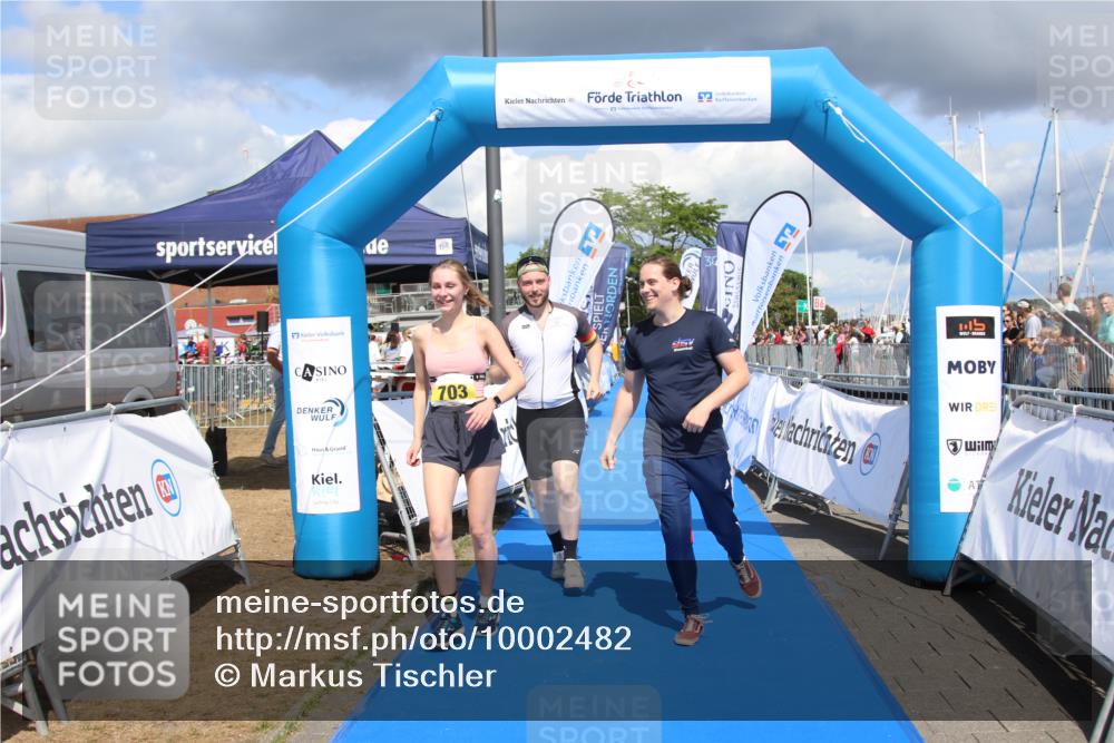 16.08.2026 - KN Förde Triathlon 2026 Markus Tischler http://msf.ph/oto/10002482 16.08.2026 14:01:52 Ziel 703, 703 meine-sportfotos.de