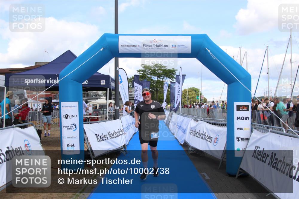 16.08.2026 - KN Förde Triathlon 2026 Markus Tischler http://msf.ph/oto/10002738 16.08.2026 14:09:49 Ziel 581, 581 meine-sportfotos.de