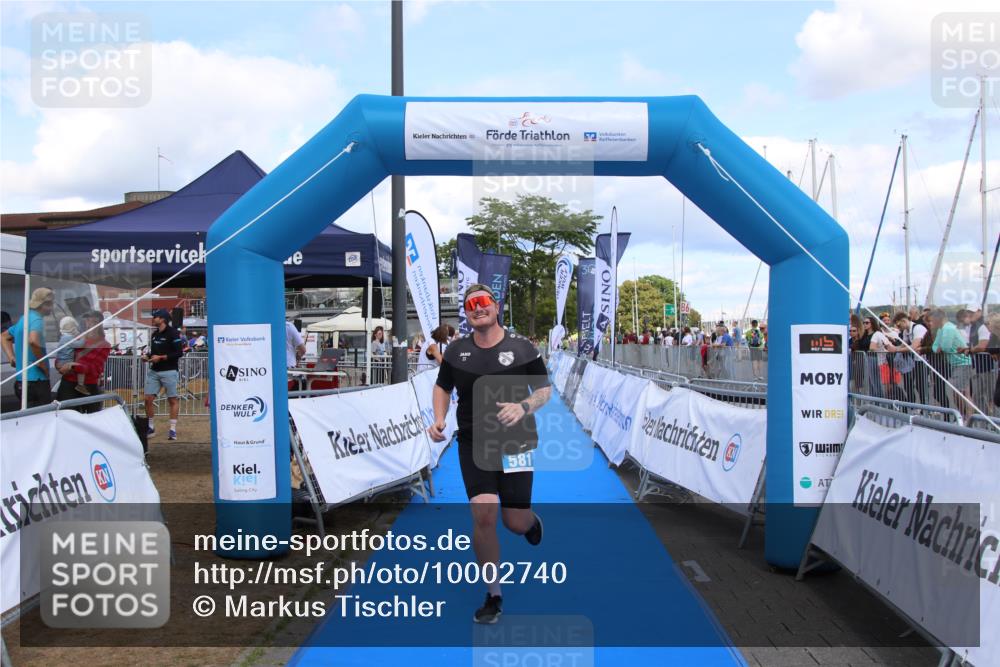 16.08.2026 - KN Förde Triathlon 2026 Markus Tischler http://msf.ph/oto/10002740 16.08.2026 14:09:49 Ziel 581, 581 meine-sportfotos.de