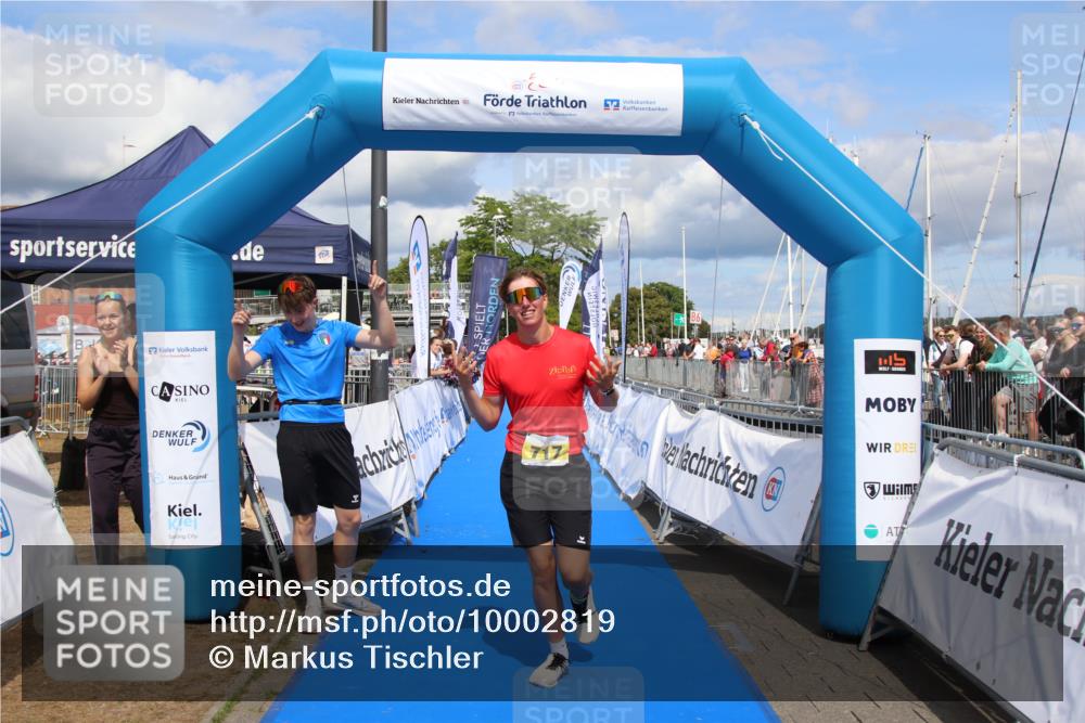 16.08.2026 - KN Förde Triathlon 2026 Markus Tischler http://msf.ph/oto/10002819 16.08.2026 14:14:08 Ziel 717, 717 meine-sportfotos.de