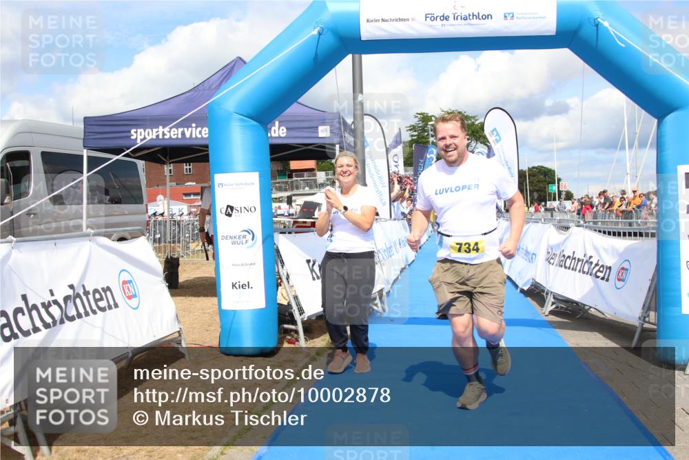 16.08.2026 - KN Förde Triathlon 2026 Markus Tischler http://msf.ph/oto/10002878 16.08.2026 14:16:47 Ziel 734, 734 meine-sportfotos.de