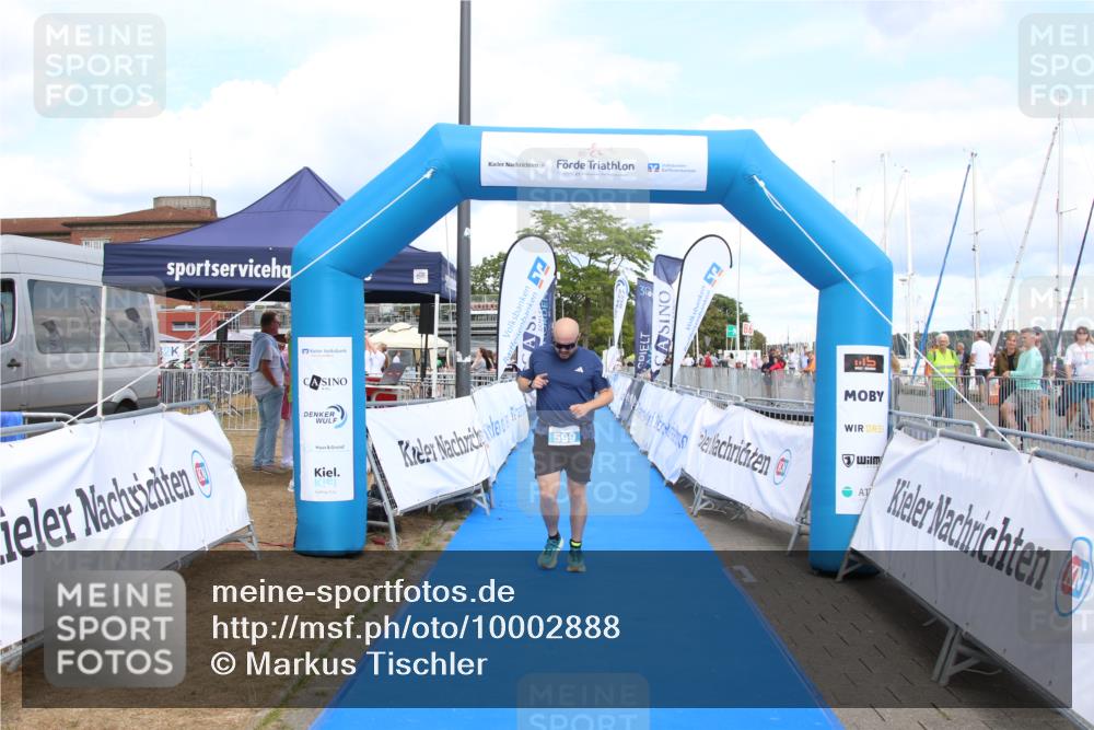 16.08.2026 - KN Förde Triathlon 2026 Markus Tischler http://msf.ph/oto/10002888 16.08.2026 14:18:10 Ziel 599, 599 meine-sportfotos.de