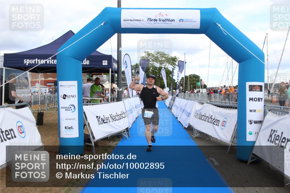 16.08.2026 - KN Förde Triathlon 2026 Markus Tischler http://msf.ph/oto/10002895 16.08.2026 14:20:43 Ziel 596, 596 meine-sportfotos.de