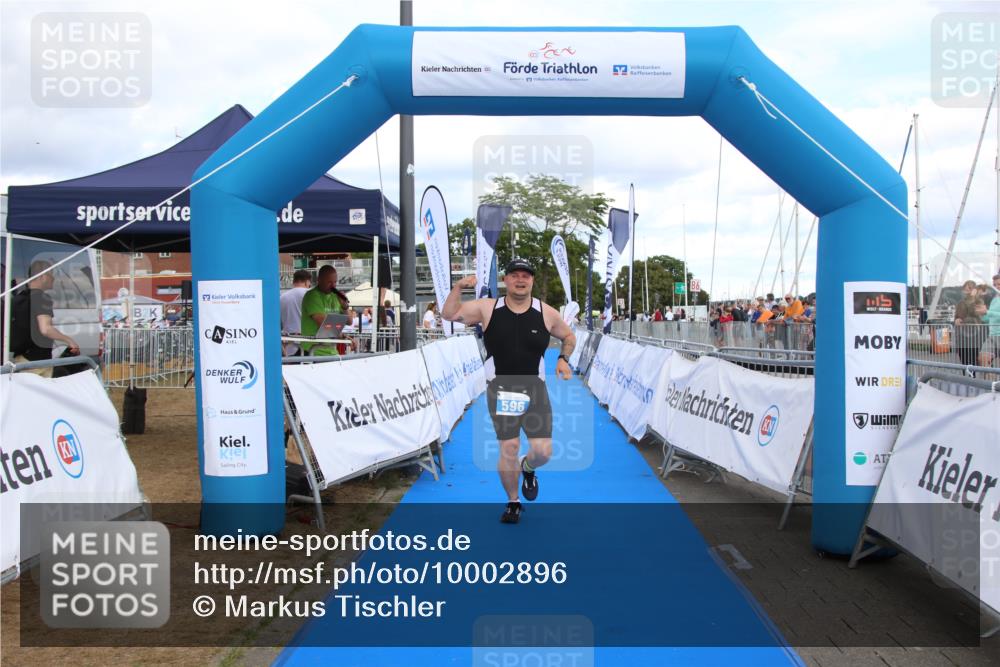 16.08.2026 - KN Förde Triathlon 2026 Markus Tischler http://msf.ph/oto/10002896 16.08.2026 14:20:44 Ziel 596, 596 meine-sportfotos.de