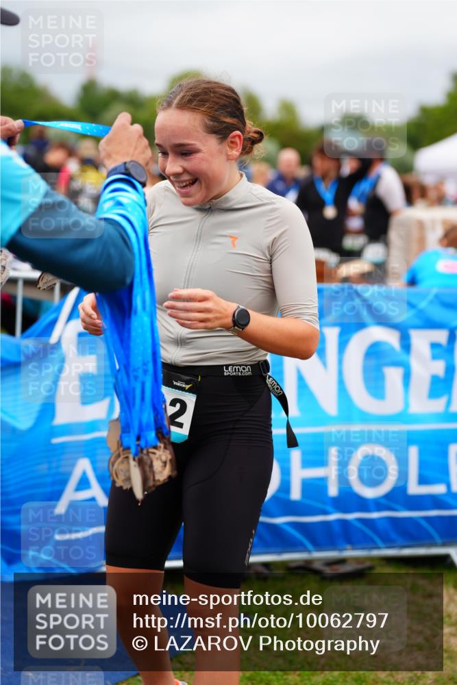 30.08.2026 - Elbe Triathlon Hamburg LAZAROV Photography http://msf.ph/oto/10062797 30.08.2026 11:50:20 Ziel 855, 912 meine-sportfotos.de