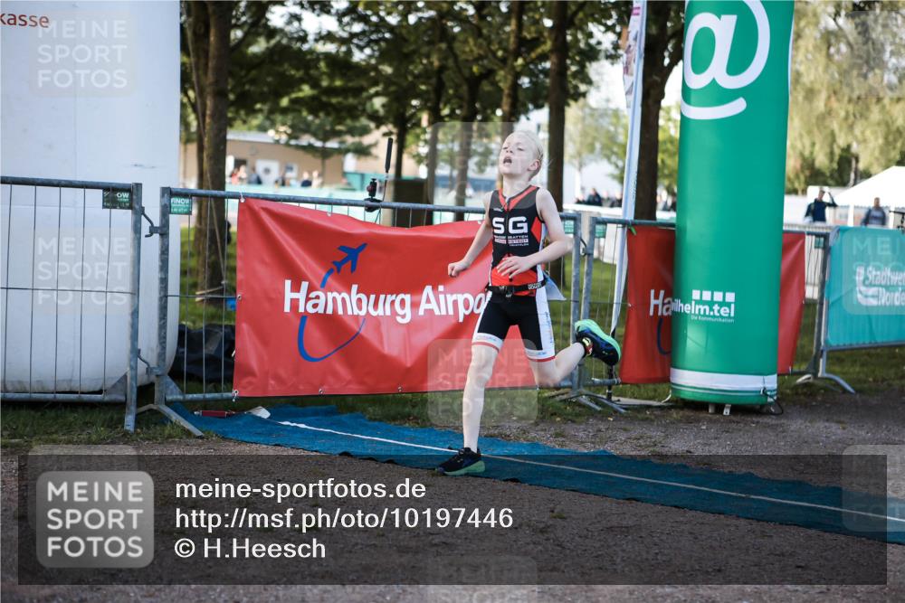 06.09.2026 - 20. Norderstedt Triathlon H.Heesch http://msf.ph/oto/10197446 06.09.2026 09:10:57 Ziel 31, 32, 34, 35, 48 meine-sportfotos.de