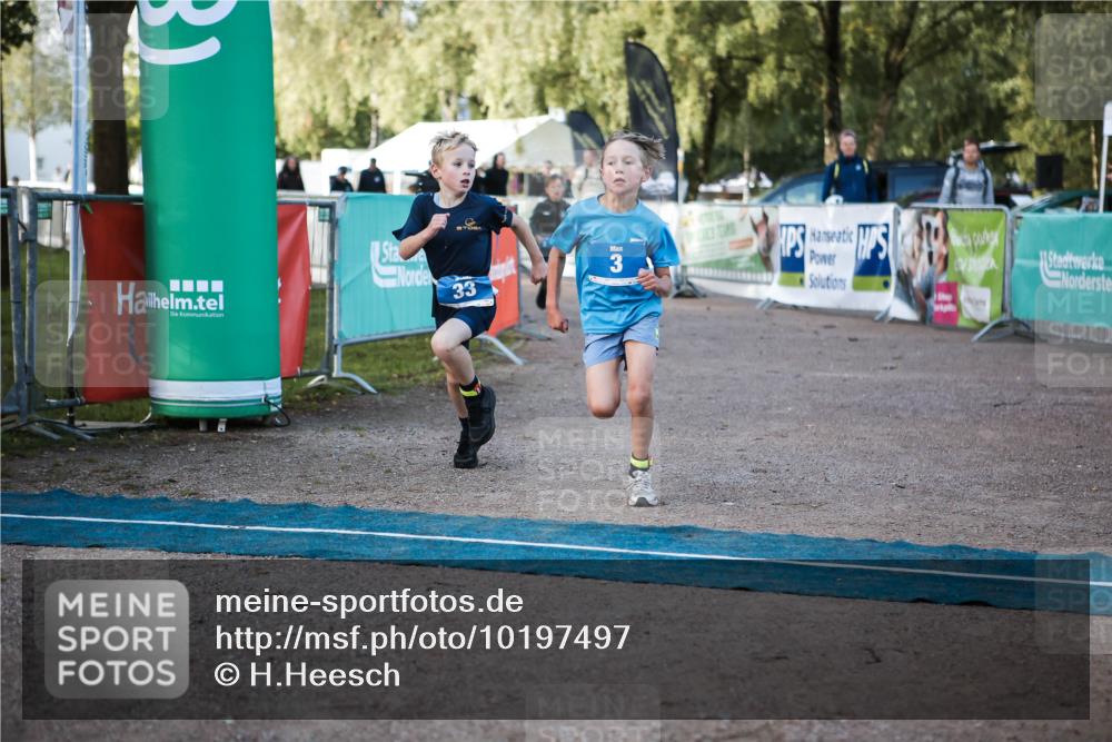 06.09.2026 - 20. Norderstedt Triathlon H.Heesch http://msf.ph/oto/10197497 06.09.2026 09:11:11 Ziel 1, 3, 8, 23, 33 meine-sportfotos.de