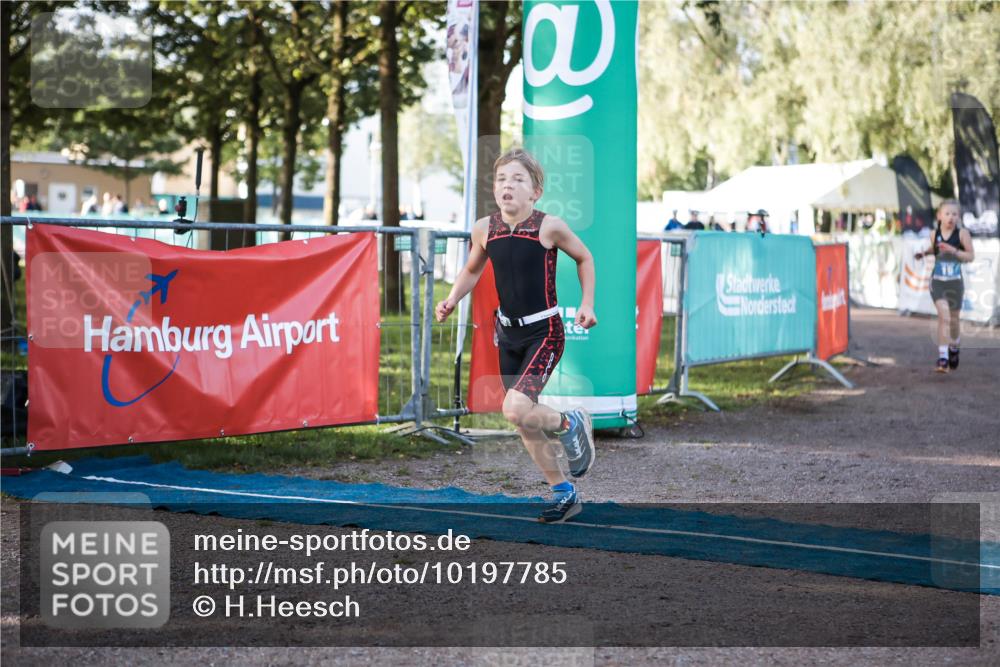 06.09.2026 - 20. Norderstedt Triathlon H.Heesch http://msf.ph/oto/10197785 06.09.2026 09:12:07 Ziel 19, 37, 40 meine-sportfotos.de