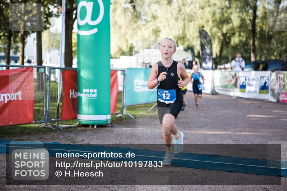 06.09.2026 - 20. Norderstedt Triathlon H.Heesch http://msf.ph/oto/10197833 06.09.2026 09:12:34 Ziel 12, 21, 29 meine-sportfotos.de