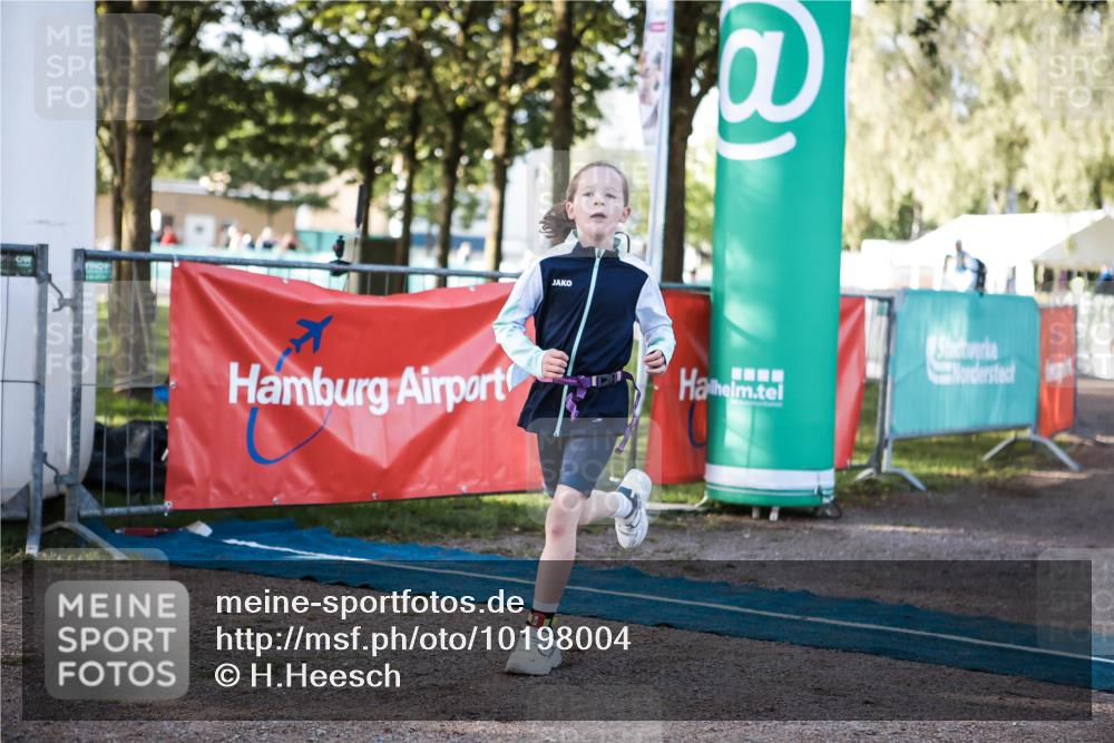 06.09.2026 - 20. Norderstedt Triathlon H.Heesch http://msf.ph/oto/10198004 06.09.2026 09:13:09 Ziel 20, 26, 38 meine-sportfotos.de