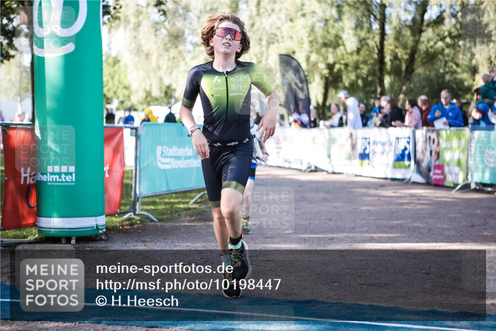 06.09.2026 - 20. Norderstedt Triathlon H.Heesch http://msf.ph/oto/10198447 06.09.2026 09:44:56 Ziel 602, 622 meine-sportfotos.de