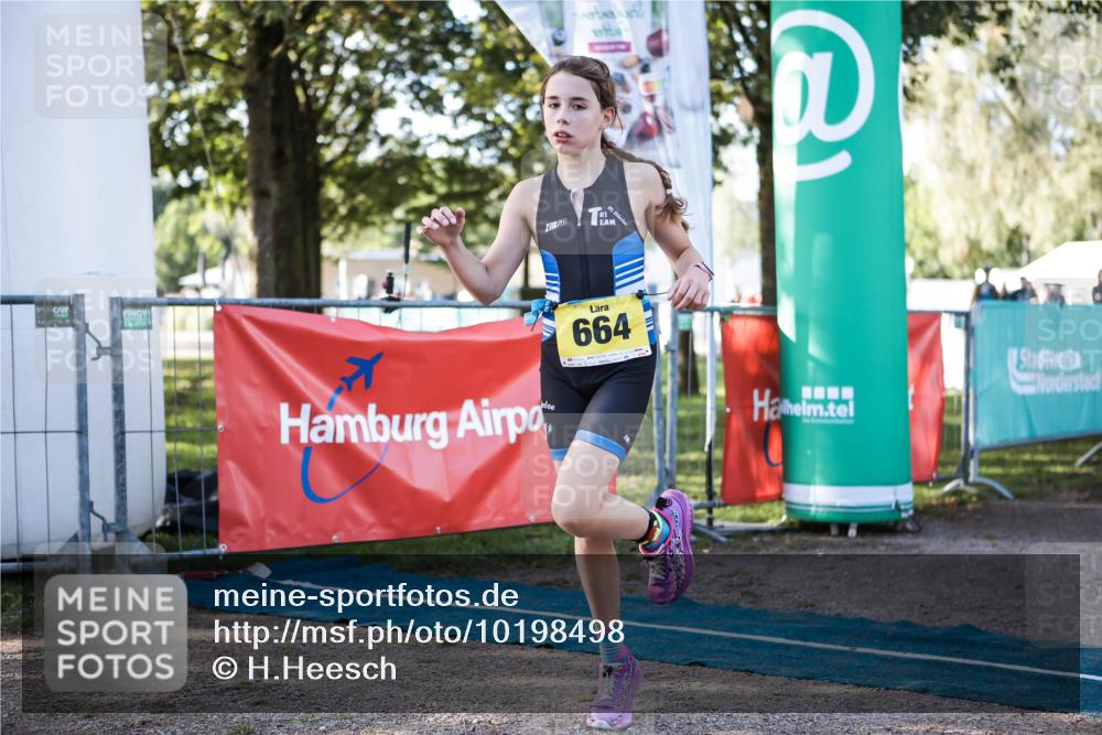 06.09.2026 - 20. Norderstedt Triathlon H.Heesch http://msf.ph/oto/10198498 06.09.2026 09:45:14 Ziel 664, 665 meine-sportfotos.de