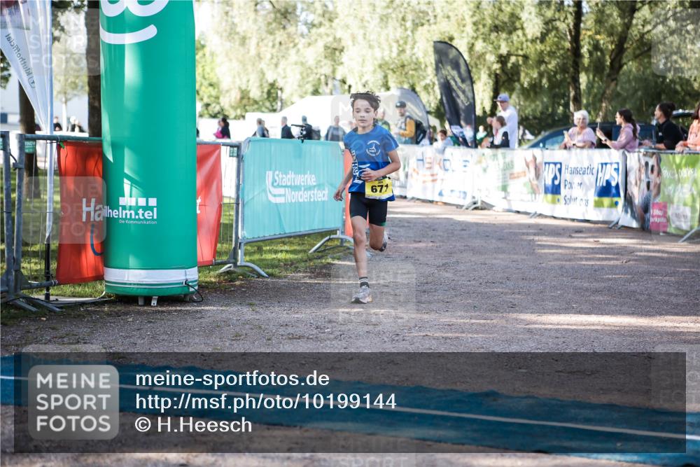 06.09.2026 - 20. Norderstedt Triathlon H.Heesch http://msf.ph/oto/10199144 06.09.2026 09:47:41 Ziel 629, 671, 675 meine-sportfotos.de