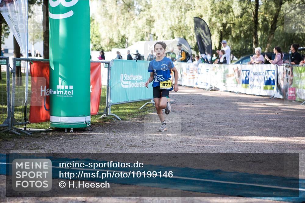 06.09.2026 - 20. Norderstedt Triathlon H.Heesch http://msf.ph/oto/10199146 06.09.2026 09:47:41 Ziel 629, 671, 675 meine-sportfotos.de