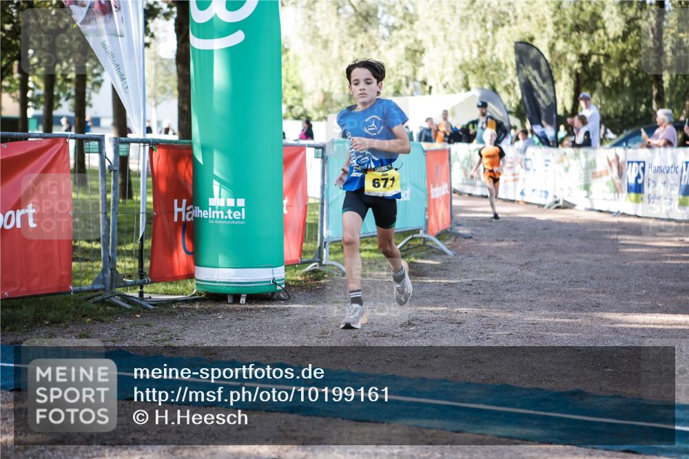 06.09.2026 - 20. Norderstedt Triathlon H.Heesch http://msf.ph/oto/10199161 06.09.2026 09:47:42 Ziel 629, 671, 675 meine-sportfotos.de