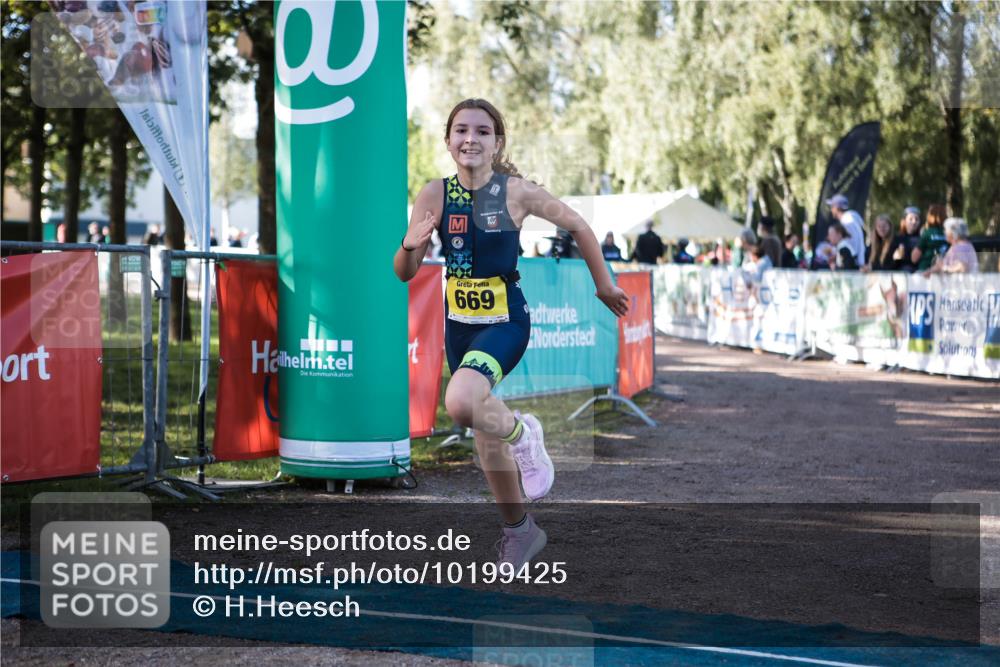 06.09.2026 - 20. Norderstedt Triathlon H.Heesch http://msf.ph/oto/10199425 06.09.2026 09:48:41 Ziel 628, 668, 669 meine-sportfotos.de