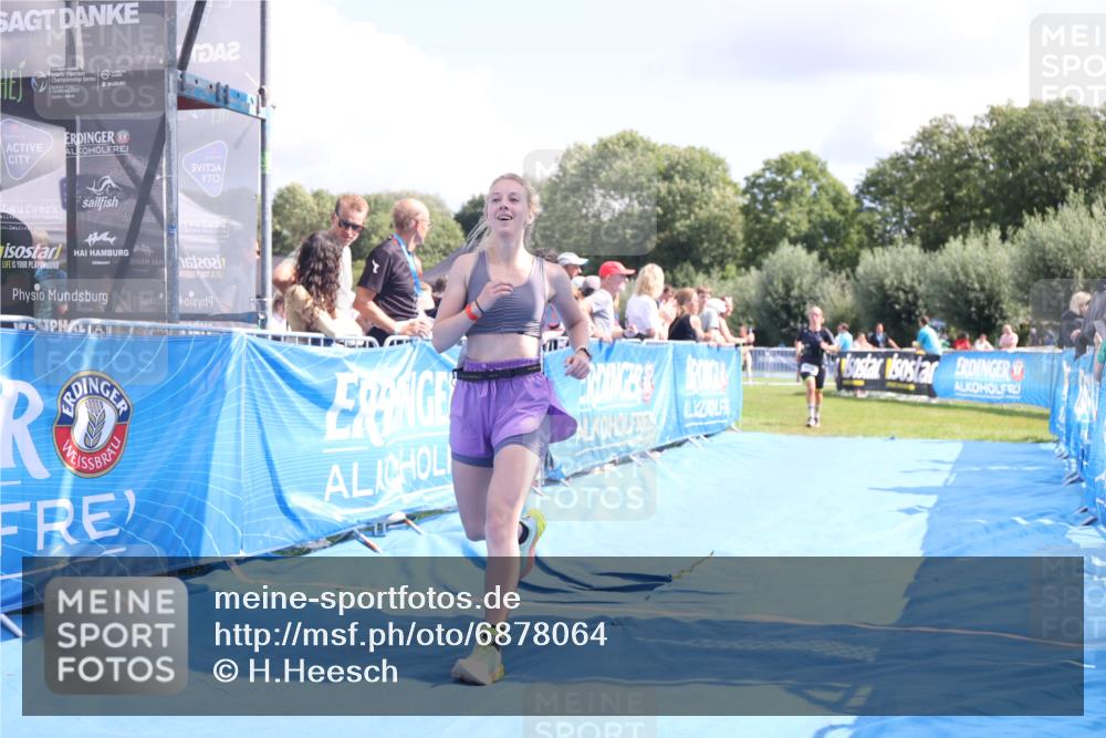 25.08.2024 - Elbe Triathlon Hamburg H.Heesch http://msf.ph/oto/6878064 25.08.2024 12:09:42 Ziel 518, 1653, 1691 meine-sportfotos.de