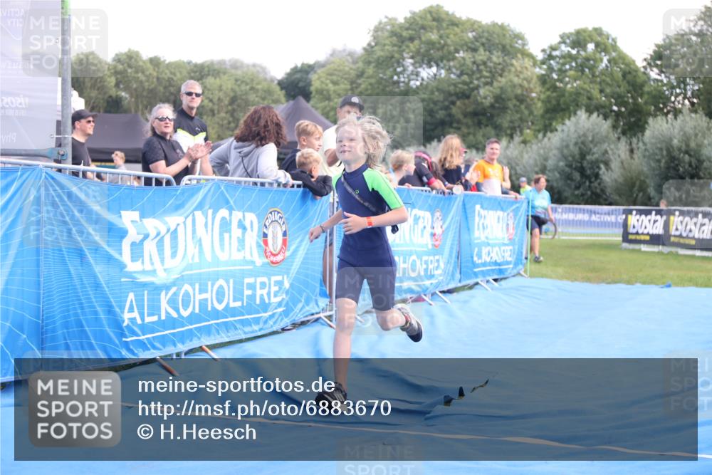 25.08.2024 - Elbe Triathlon Hamburg H.Heesch http://msf.ph/oto/6883670 25.08.2024 13:02:09 Ziel 1828 meine-sportfotos.de