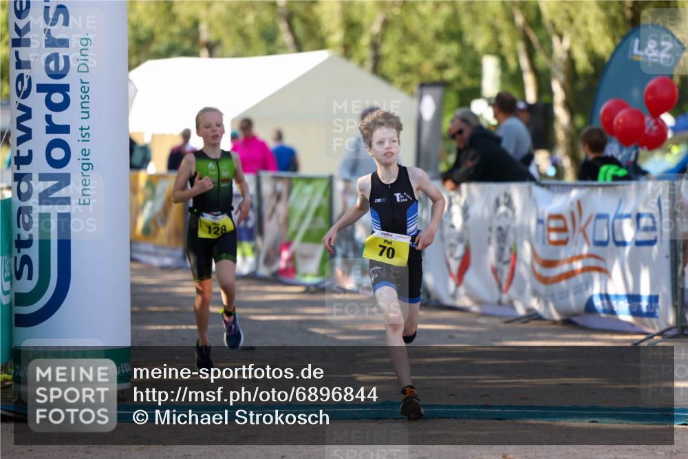 01.09.2024 - 17. Tribühne Triathlon Michael Strokosch http://msf.ph/oto/6896844 01.09.2024 09:50:09 Ziel 70, 92, 128 meine-sportfotos.de