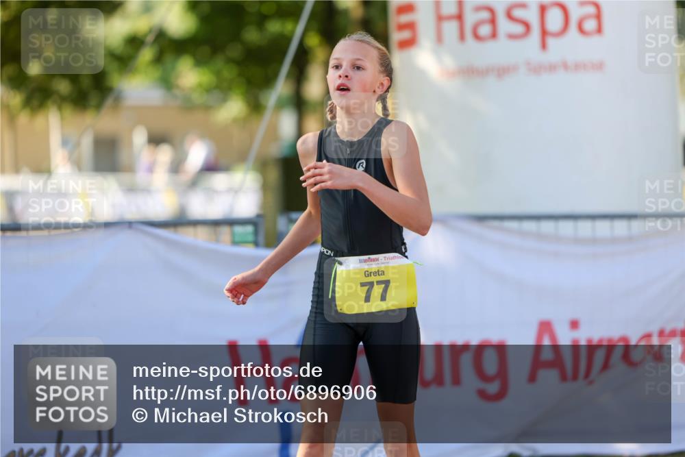 01.09.2024 - 17. Tribühne Triathlon Michael Strokosch http://msf.ph/oto/6896906 01.09.2024 09:50:20 Ziel 77, 104, 113 meine-sportfotos.de