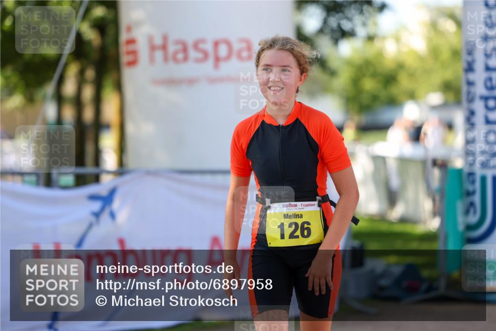 01.09.2024 - 17. Tribühne Triathlon Michael Strokosch http://msf.ph/oto/6897958 01.09.2024 09:55:08 Ziel 126 meine-sportfotos.de