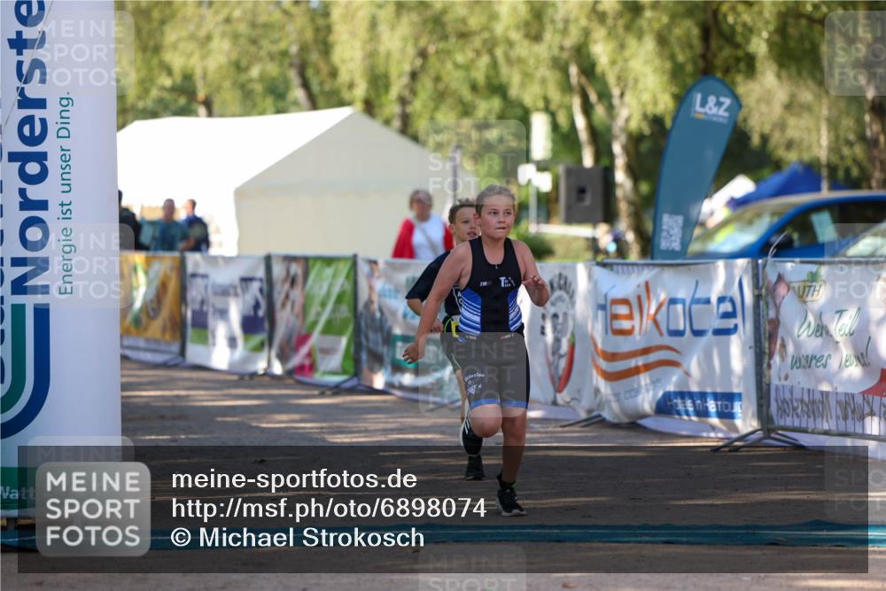01.09.2024 - 17. Tribühne Triathlon Michael Strokosch http://msf.ph/oto/6898074 01.09.2024 09:55:45 Ziel 116, 122 meine-sportfotos.de