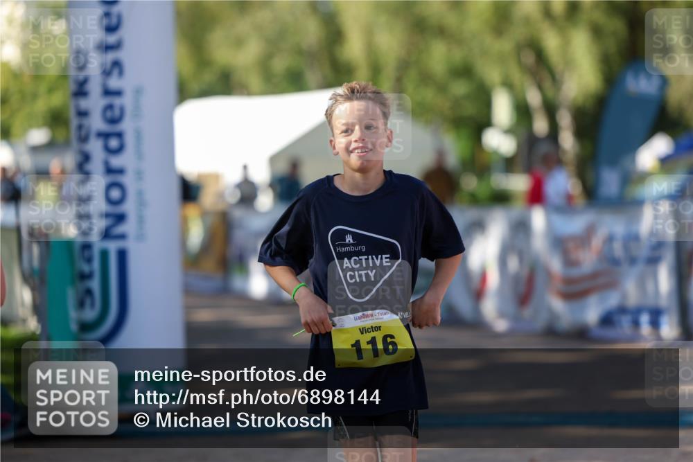01.09.2024 - 17. Tribühne Triathlon Michael Strokosch http://msf.ph/oto/6898144 01.09.2024 09:55:49 Ziel 74, 116, 122 meine-sportfotos.de