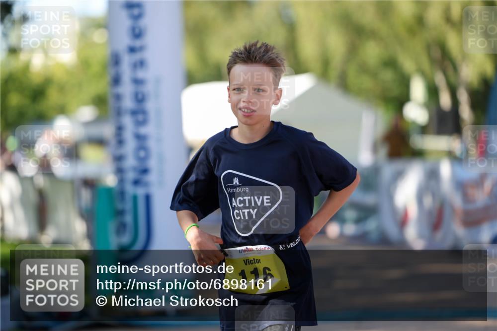 01.09.2024 - 17. Tribühne Triathlon Michael Strokosch http://msf.ph/oto/6898161 01.09.2024 09:55:50 Ziel 74, 116, 122 meine-sportfotos.de
