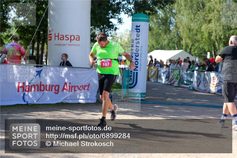01.09.2024 - 17. Tribühne Triathlon Michael Strokosch http://msf.ph/oto/6899284 01.09.2024 10:50:28 Ziel 167 meine-sportfotos.de