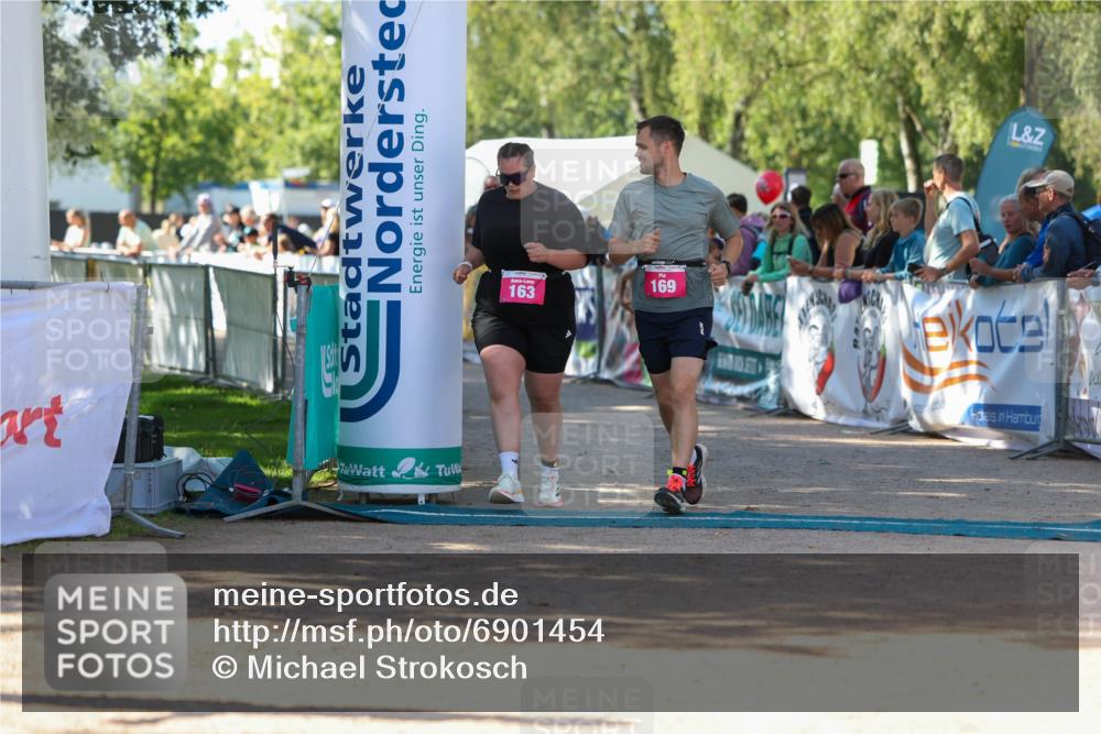 01.09.2024 - 17. Tribühne Triathlon Michael Strokosch http://msf.ph/oto/6901454 01.09.2024 10:59:21 Ziel 163, 169, 304 meine-sportfotos.de