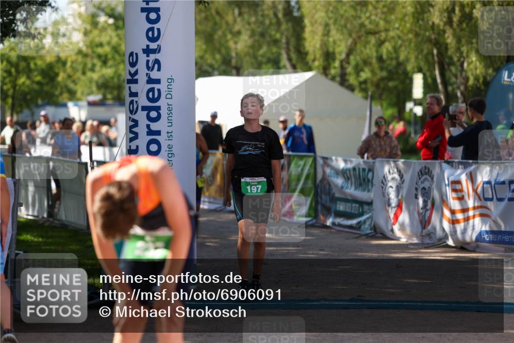 01.09.2024 - 17. Tribühne Triathlon Michael Strokosch http://msf.ph/oto/6906091 01.09.2024 11:10:17 Ziel 108, 180, 189, 197 meine-sportfotos.de
