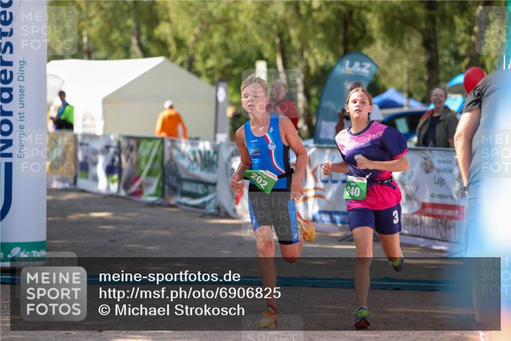 01.09.2024 - 17. Tribühne Triathlon Michael Strokosch http://msf.ph/oto/6906825 01.09.2024 11:13:14 Ziel 201, 202, 240 meine-sportfotos.de