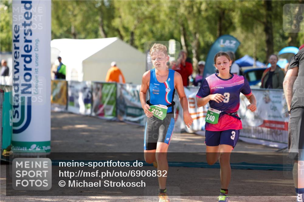 01.09.2024 - 17. Tribühne Triathlon Michael Strokosch http://msf.ph/oto/6906832 01.09.2024 11:13:14 Ziel 201, 202, 240 meine-sportfotos.de