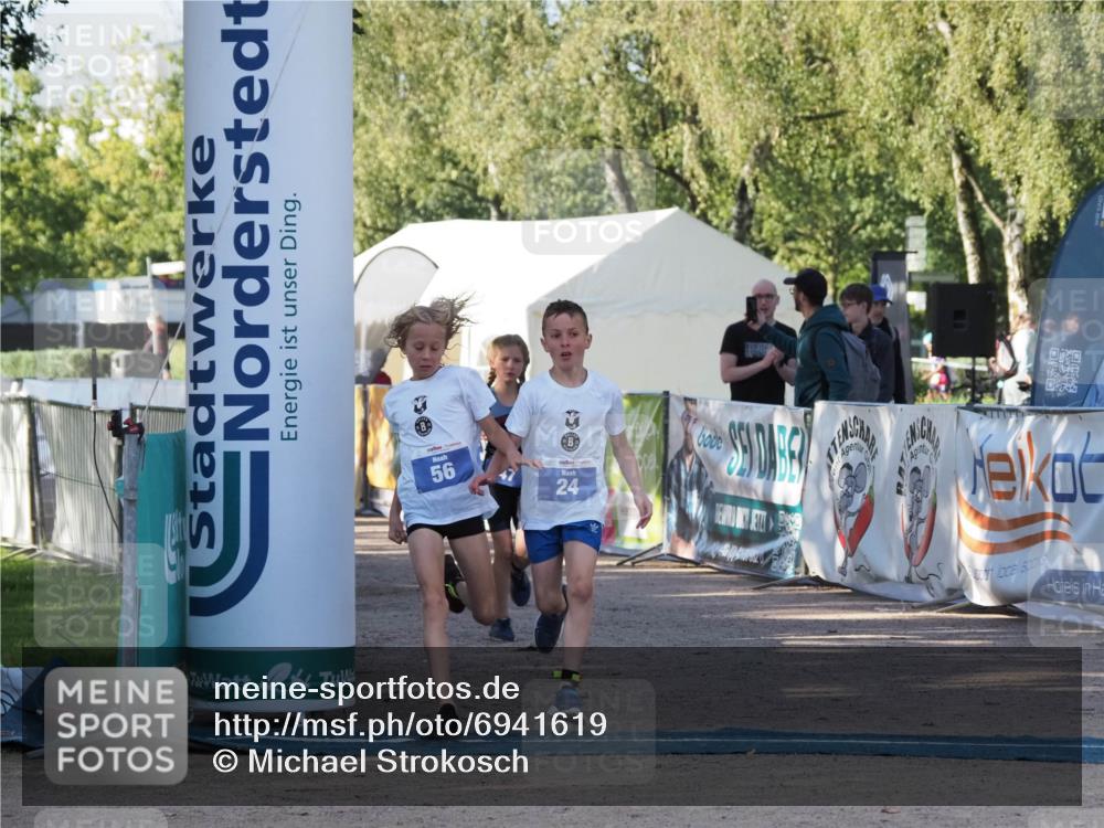 01.09.2024 - 17. Tribühne Triathlon Michael Strokosch http://msf.ph/oto/6941619 01.09.2024 09:16:32 Ziel 22, 24, 47, 56 meine-sportfotos.de