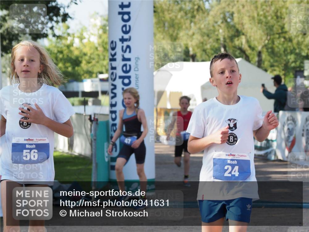 01.09.2024 - 17. Tribühne Triathlon Michael Strokosch http://msf.ph/oto/6941631 01.09.2024 09:16:34 Ziel 22, 24, 47, 56 meine-sportfotos.de