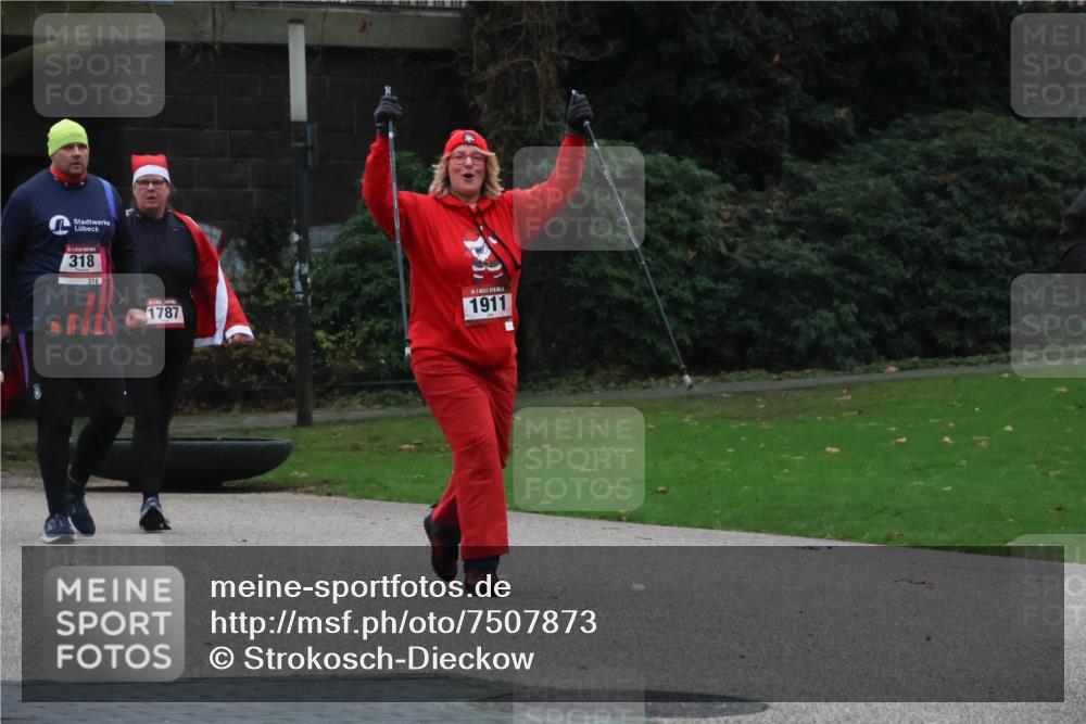 08.12.2024 - St. Pauli X-Mass-Run No. 14 Strokosch-Dieckow http://msf.ph/oto/7507873 08.12.2024 09:48:20 Laufen 318, 318, 1787, 1911 meine-sportfotos.de