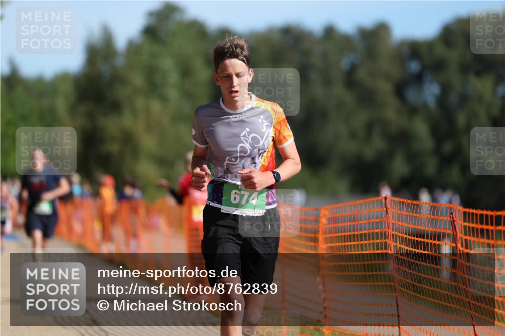 07.09.2025 - 19. Norderstedt Triathlon Michael Strokosch http://msf.ph/oto/8762839 07.09.2025 10:47:04 Laufen 105, 674, 693 meine-sportfotos.de