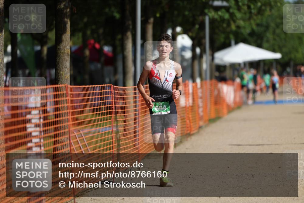 07.09.2025 - 19. Norderstedt Triathlon Michael Strokosch http://msf.ph/oto/8766160 07.09.2025 10:49:52 Laufen 92, 664, 1118 meine-sportfotos.de