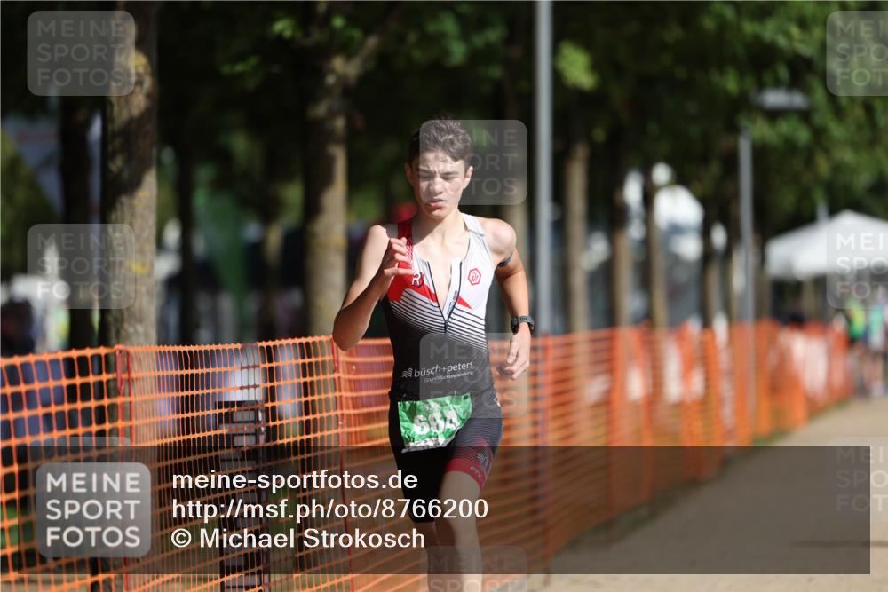 07.09.2025 - 19. Norderstedt Triathlon Michael Strokosch http://msf.ph/oto/8766200 07.09.2025 10:49:53 Laufen 92, 664, 1118 meine-sportfotos.de