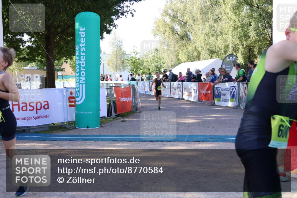 07.09.2025 - 19. Norderstedt Triathlon Zöllner http://msf.ph/oto/8770584 07.09.2025 09:46:55 Ziel 556, 570, 633 meine-sportfotos.de