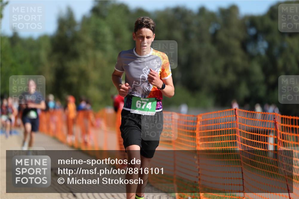 07.09.2025 - 19. Norderstedt Triathlon Michael Strokosch http://msf.ph/oto/8816101 07.09.2025 10:47:04 Laufen 105, 674, 693 meine-sportfotos.de