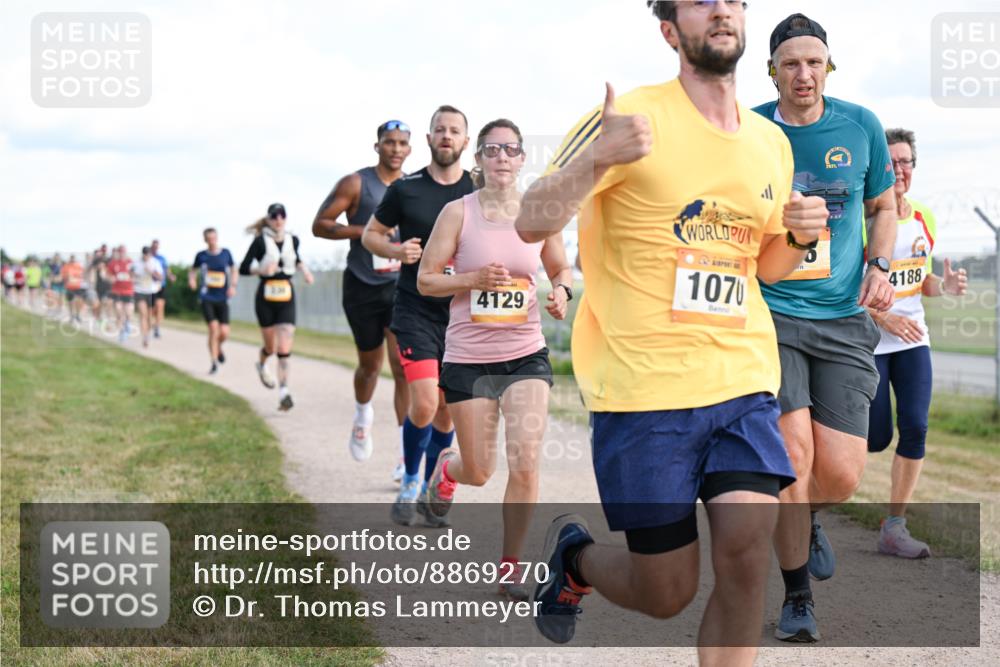 14.09.2025 - Airport Race Dr. Thomas Lammeyer http://msf.ph/oto/8869270 14.09.2025 12:13:36 Laufen 4129, 1070, 4188 meine-sportfotos.de