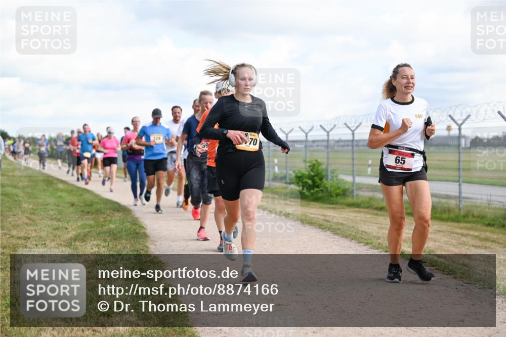14.09.2025 - Airport Race Dr. Thomas Lammeyer http://msf.ph/oto/8874166 14.09.2025 12:18:53 Laufen 329, 69, 70, 65 meine-sportfotos.de