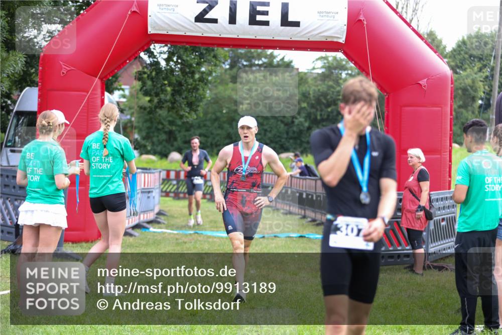 21.06.2026 - 29. Vierlanden-Triathlon Andreas Tolksdorf http://msf.ph/oto/9913189 21.06.2026 11:03:03 Ziel 312, 332 meine-sportfotos.de